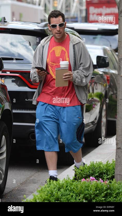 Adam Sandler Carrying A Hot Beverage And Overdressed On A Hot Day In New York City Featuring