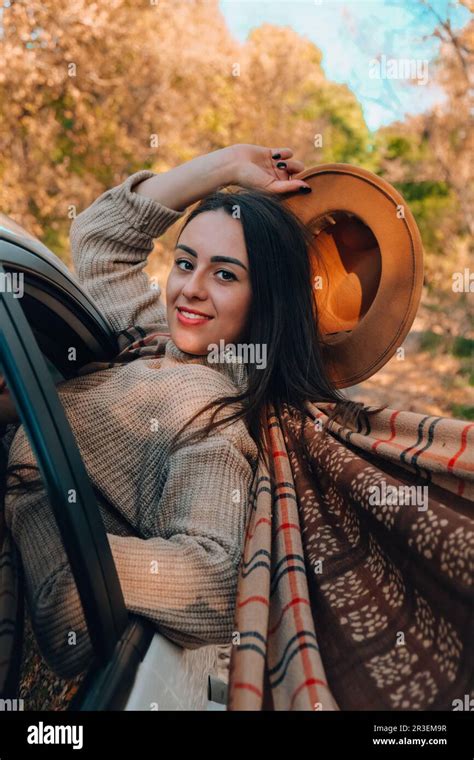 Brunette European Looking Cute Girl Sitting In A Car Enjoying Sunny Autumn Weekend Travel And