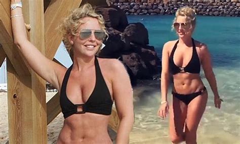 Lydia Bright Sizzles In Plunging Black Halter Bikini Daily Mail Online