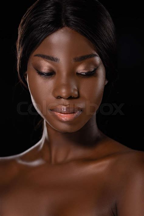 African American Naked Woman Looking Down Isolated On Black Stock Image Colourbox
