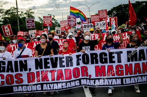 filipino activists march  protest commemorating editorial stock