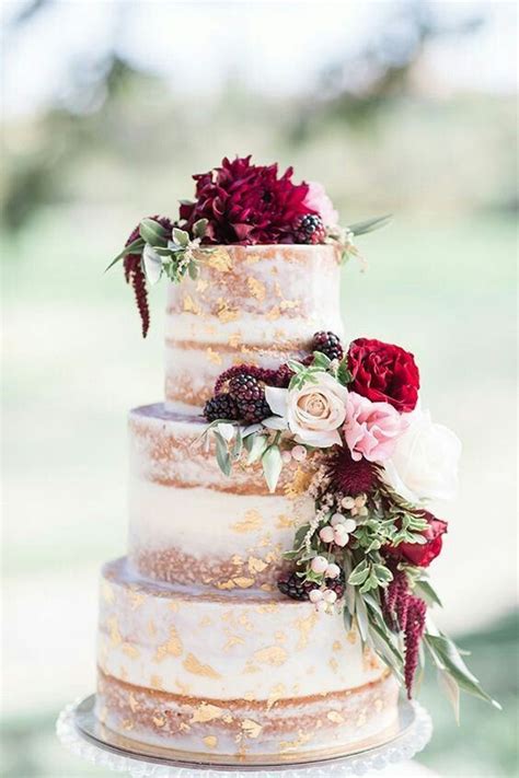 Semi Naked Wedding Cake With Gold Leaf And Flowers Burgundy Wedding Cake Naked Wedding Cakes