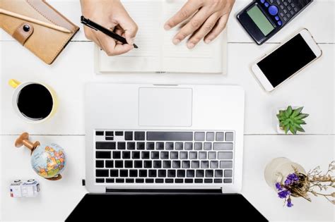 Premium Photo Top View Of White Office Desk With Laptop And Coffee Cup