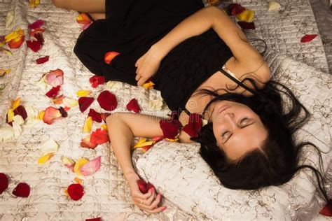 Sexual Brunette Sleeping On A Bed Stock Image Image Of Accessories Expression