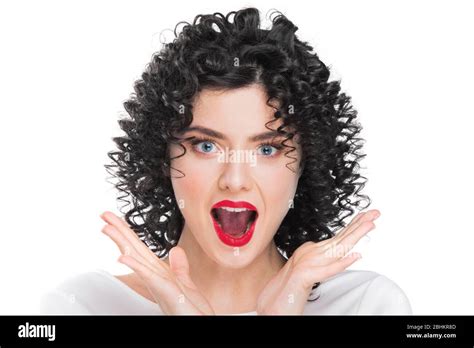 Portrait Of Beautiful Curly Hair Brunette Girl Isolated On White Background Surprised Emotional