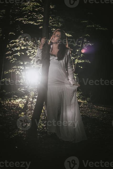 Alone Girl In Forest 14150317 Stock Photo at Vecteezy