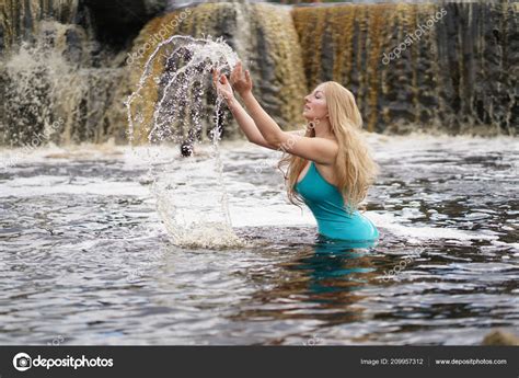 Beautiful Curvaceous Blonde Woman Plays Water Background Waterfall
