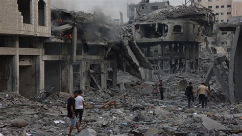 Photos: Palestinian wake up to scenes of mass destruction | Middle East Eye