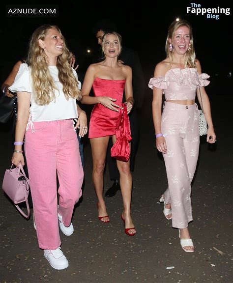 Margot Robbie Rocks London In A Sexy Red Hot Dress Cleavage AZNude