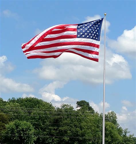 giant american flag raised  camp liberty  cullman tribune