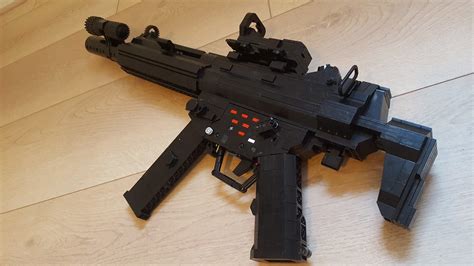 H&K MP5SD with light mounted on the barrel and C-MORE redd… | Flickr