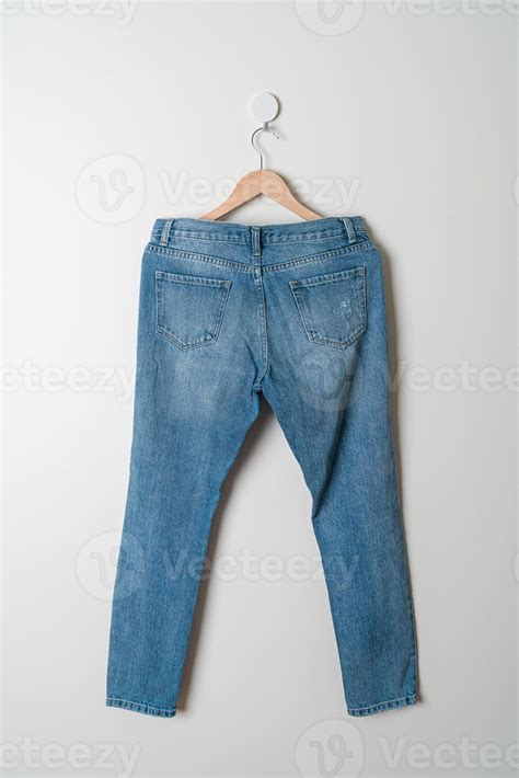 Jeans Trousers Hanging On Wall 5368864 Stock Photo At Vecteezy