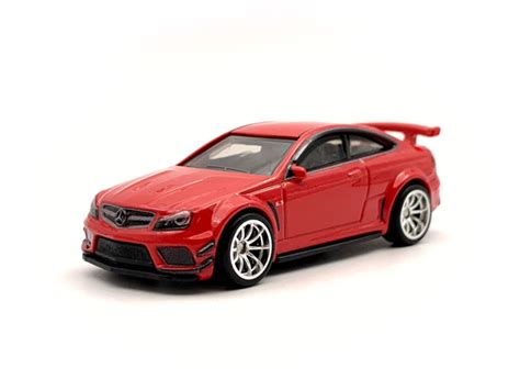 Машинка Hot Wheels Premium Mercedes Benz C AMG Coupe Black Series