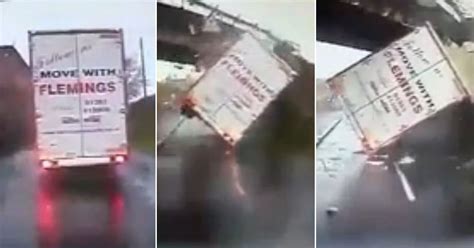 Watch Dramatic Moment Lorry Smashes Into Low Railway Bridge Before