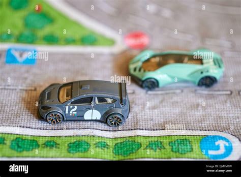 The Mattel Hot Wheels Toy Model Fiat Fiesta Car On A Play Road Mat Stock Photo Alamy