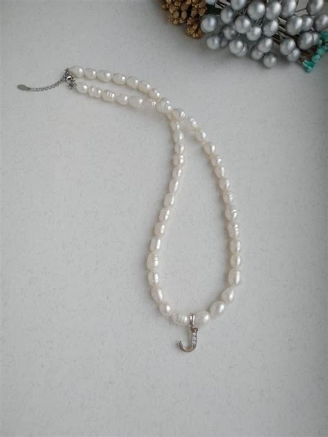 Чокер из жемчуга с буквой