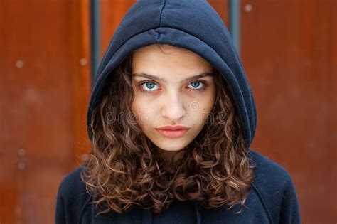 White Brunette Teenage Girl With Curly Hair Poses On The Street In The City Stock Image Image
