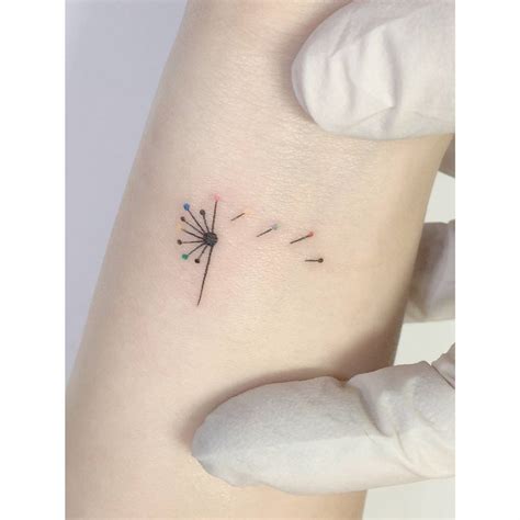 Dandelion Tattoo Placed On The Wrist Minimalistic