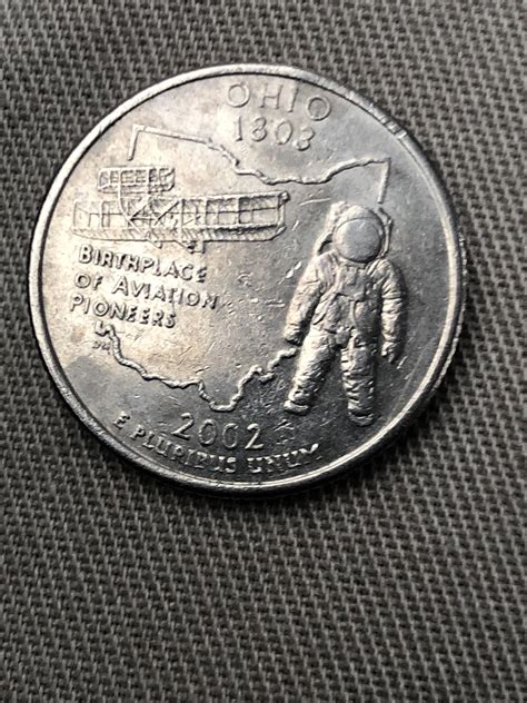 The Ohio Coin. (Chaos Relic) if heads, you are cursed with weakness. If