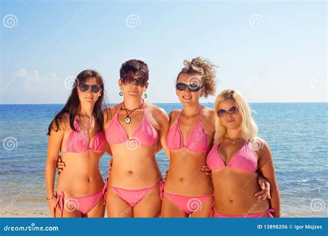Girls In Bikinis On Beach Stock Image 96611971