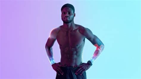 Premium Photo Handsome Black Sportsman With Naked Torso Posing In Neon Light