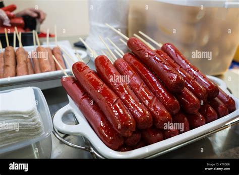 A Hot Dog Sausage On A Sticka Favourite Street Food Snack In The