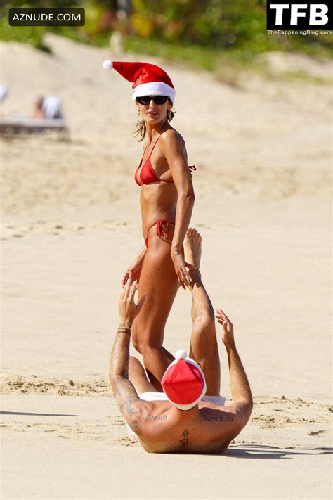 Izabel Goulart Sexy Gets Into The Christmas Spirit Wearing A Tiny Red Bikini At The Beach In St