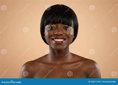 Portrait Of Attractive Naked Black Lady On Beige Background Stock Image