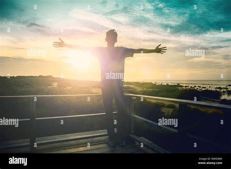Silhouette Man Happy With Hands Rise Up On Beautiful Christian Praise