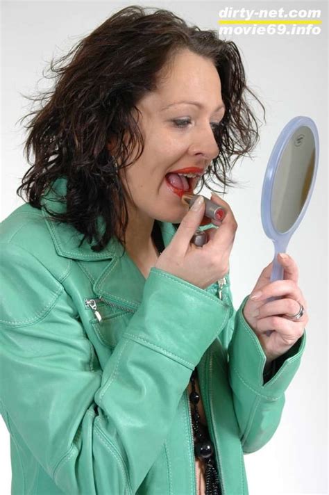 MILF Lea Is Making Up Her Lips In A Green Leather Jacket 27 Pics XHamster
