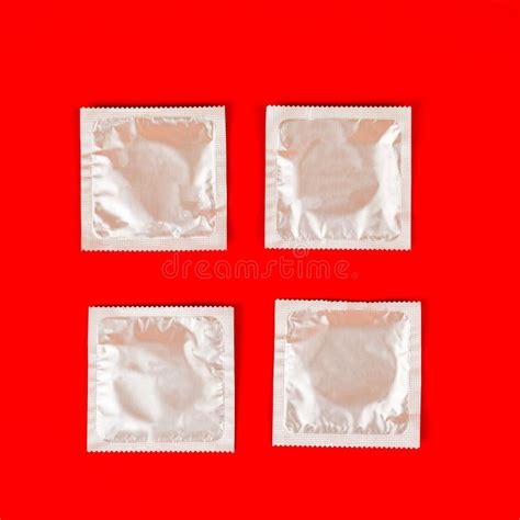 Condom On Red Background Safe Sex Concept Stock Photo Image Of