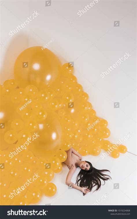 Nude Woman Between Many Yellow Balloons Stock Photo Shutterstock