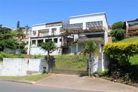 Minerva Road eyesore house lies unfinished because of legal dispute