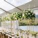 Wood Farm Table With Tall Greenery Centerpieces