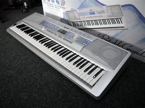 Yamaha DGX 200 Portable Grand 76 Key Keyboard W Box PSU 2nd Hand