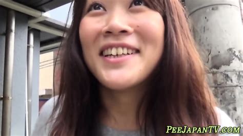 Naughty Babe Urinating On The Street