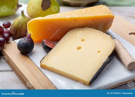 Pieces of Aged Original Dutch Hard Cheeses Close Up Stock Photo - Image ...