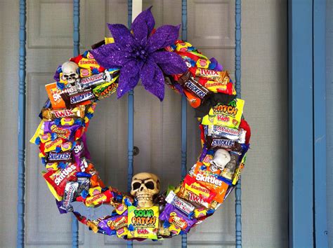 Halloween Candy wreath with skulls and bats on it | Diy halloween ...