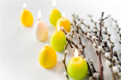 Premium Photo Pussy Willow Branches And Easter Egg Candles