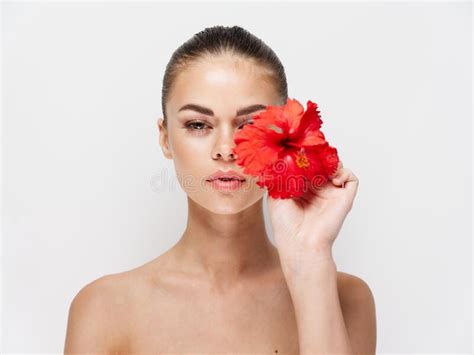 Pretty Woman With Red Flower Near Face Naked Shoulders Cropped View Stock Image Image Of Girl