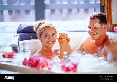 An Attractive Couple In A Resort Hot Tub Stock Photo Alamy