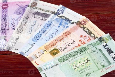 Libyan dinar a business background 21570903 Stock Photo at Vecteezy