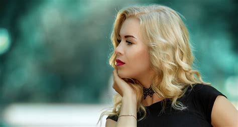 Sergey Baryshev Face Red Lipstick Hand On Face Side View Blonde