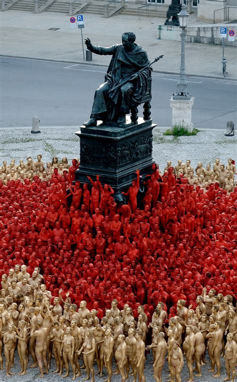 Photographer Spencer Tunicks Mass Nude Art Installations