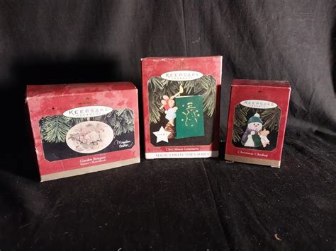 THREE HALLMARK KEEPSAKE ORNAMENTS | EstateSales.org