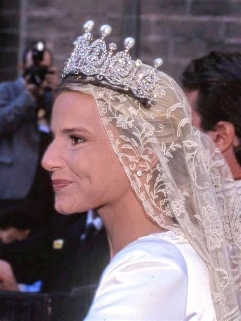 A Woman Wearing A Veil And Tiara