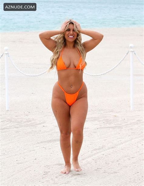 Bethan Kershaw Wearing A Bright Very Skimpy Orange Bikini Showing Off All Her Sensational Curves