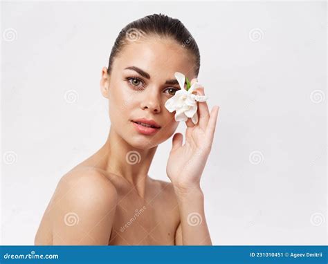 Pretty Woman Naked Shoulders White Flower Near Face Cosmetics Stock Image Image Of Femininity