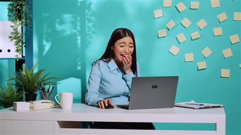 Premium Photo Young Woman Using Laptop At Office