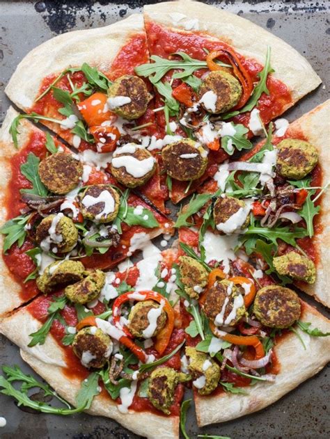 This Vegan Falafel Pizza Is Made With Spicy Harissa Spiked Tomato Sauce